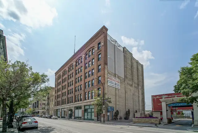 Fairchild Lofts in historic Exchange District with Gated Parking