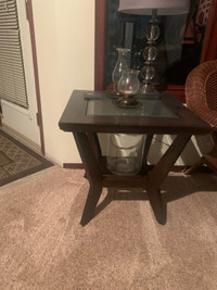 Two solid wood end tables, glass inlay with shelf$45 each 