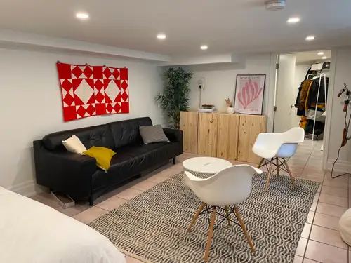 Bright, cozy, recently refreshed basement studio apartment in lovely Victorian building. Open concep...