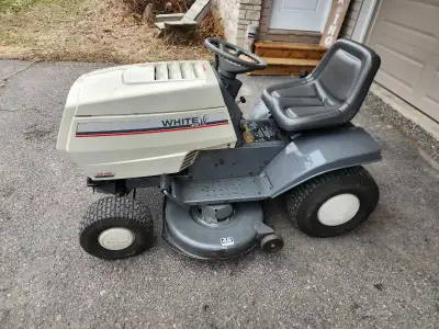 Selling a used white LT-165 Lawn tractor in excellent condition. - White LT-165 - Between 1994 and 1...