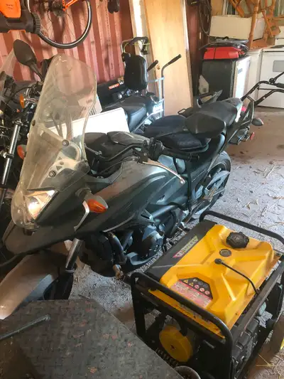 Good shape, well maintained, extremely low mileage 14093km, stored indoor in winters now 70 years an...