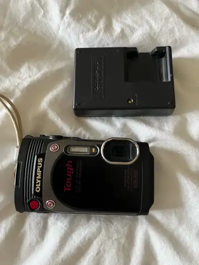 I'm selling my used Olympus Stylus TG-870 digital camera, a rugged and waterproof point-and-shoot pe...