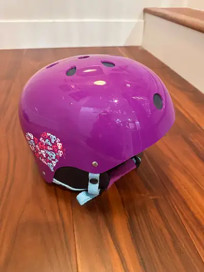Stay protected on the slopes with this purple Decibel ski and snowboard helmet, which is in used con...