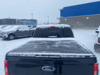 Facotry Ford Tonneau Cover, 145” WB 5.5ft box.