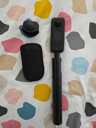 Insta360 one X2, carry pouch, lens caps and selfie stick, View more