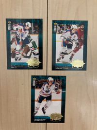 Three 1995-96 Upper Deck Wayne Gretzky Record Collection Inserts