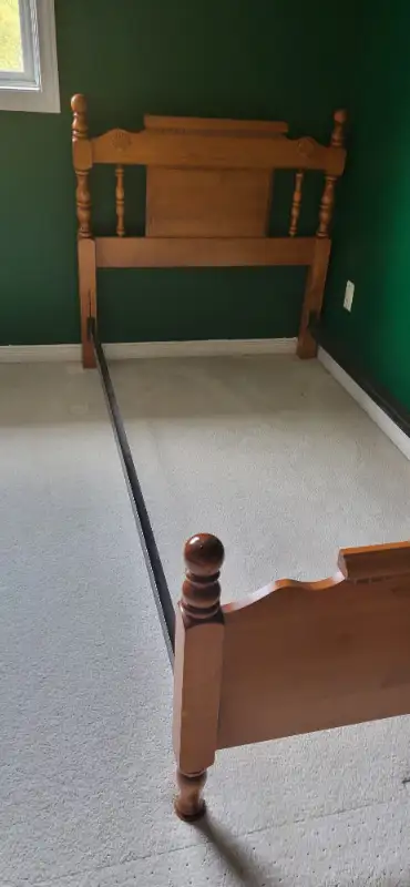 Twin bed made of solid wood. Box and matress are included.