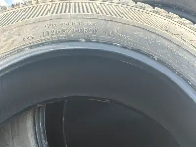 These Goodyear Wrangler tires in size LT265/60R20 offer excellent performance for your vehicle, used...