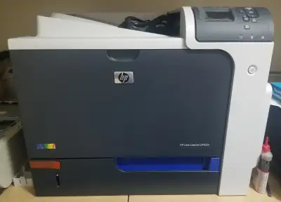 HP Color LaserJet Enterprise CP4025 printer with toner cartridge, View more