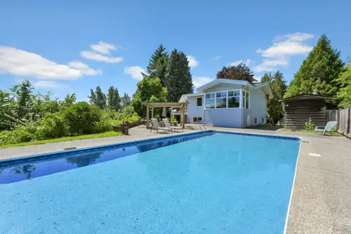 Nestled atop a private hill on a quiet, family-owned 27-acre farm, this spacious and well-maintained...