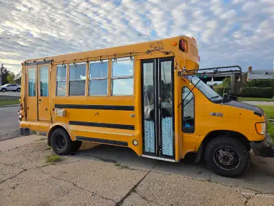 4 Season school bus camper conversion 2001 Ford E-450, 7.3 Litre Diesel. Runs and drives Great with...