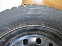 two 195/60R15 Ice Blazer Studded tires with rims