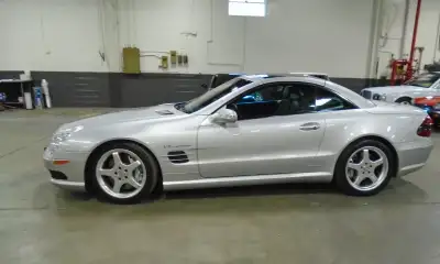 2003 Mercedes Benz SL55 AMG Convertible V8 5.5L Supercharged 73,284 kilometers $32,000 Certified