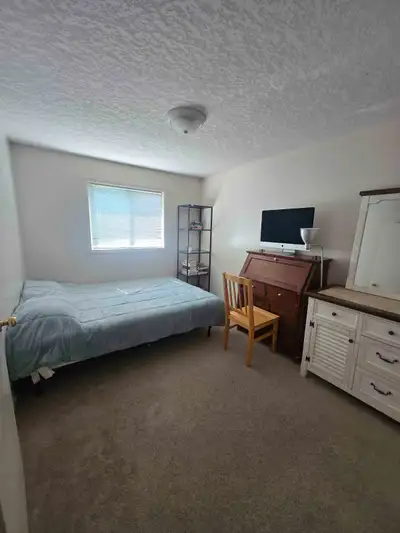 A clean, quiet, and well-maintained room in a beautiful single-family home located in a safe and pea...