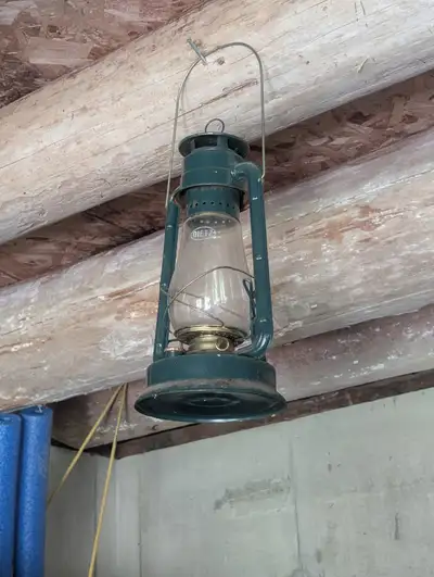 Set of three vintage oil lamps. Would make great decor for a cottage or boat house.