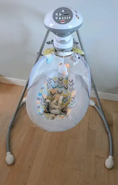 This Fisher-Price swing offers soothing motions, calming music, and engaging toys to keep your baby...