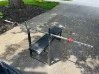 Weight bench and barbell 