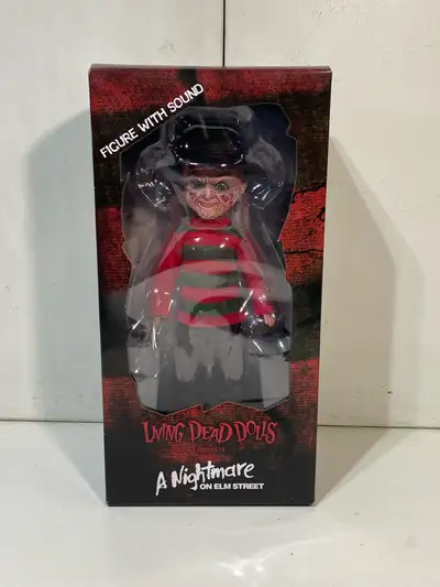 I am selling a Living Dead Dolls Presents A Nightmare on Elm Street - Freddy action figure with soun...