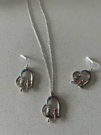  Silver pendant, and earrings, View more
