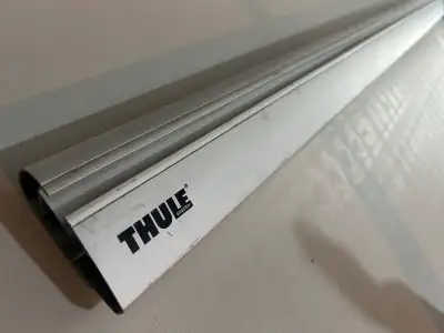 Selling only one bar. End caps, rubber strips not included. 1 bar only! Thule aero blade 53 inch bar