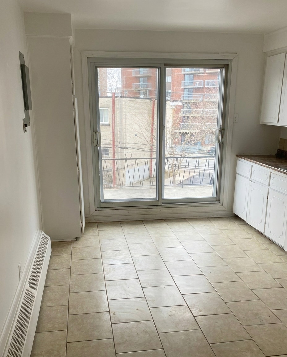 Grand 41/2 à Montréal-Nord eau chaude et chauffage inclus. — photo 3