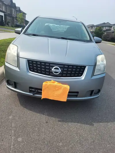 Nissan Sentra 2008. Milage 280000. Service Engine sign is on . It comes with winter tires installed...