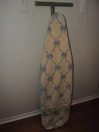 Here's a full-size ironing board, ideal for your needs. Nothing wrong with it, complete with pad and...