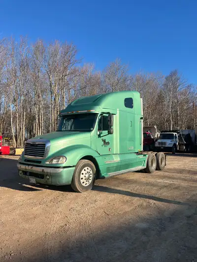 14 L 60 Series Detroit, 13 speed, truck is in good condition for its age.