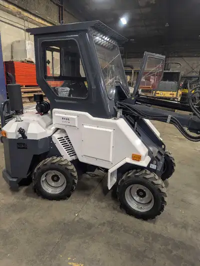 Loader Forklift with telescopic boom, powered with reliable Kubota Diesel 1105. Articulated frame ma...