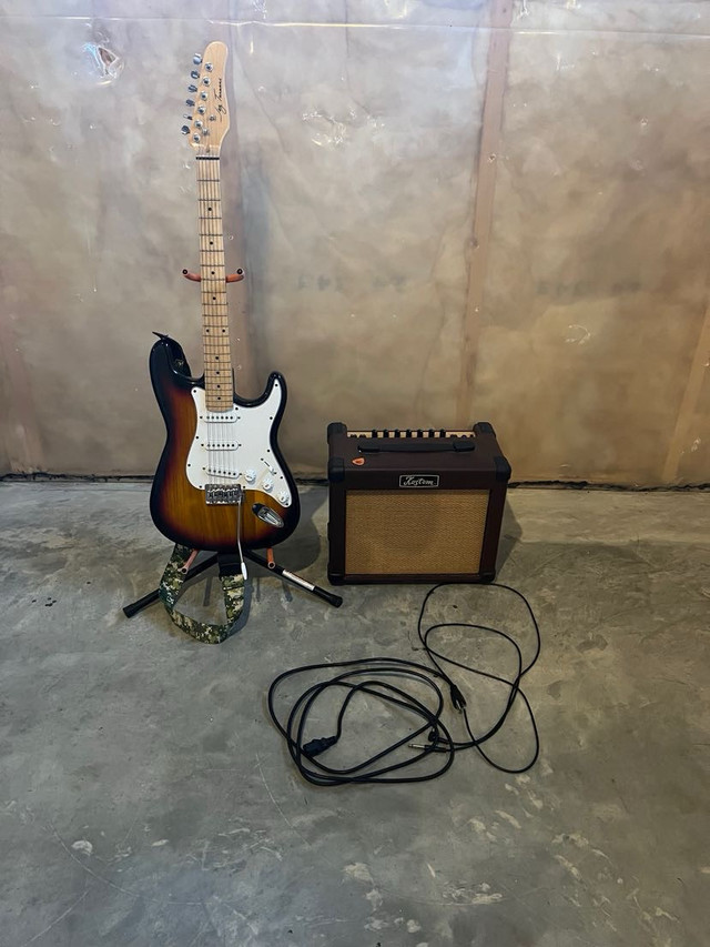 Guitar, Amp, Stand, and cords in Guitars in Red Deer