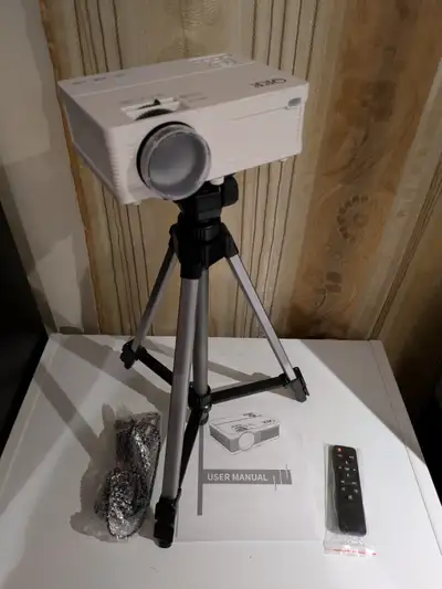 QKK QK02 LCD Projector with remote for Sale. Like new, everything works great. The QKK QK02 is a por...