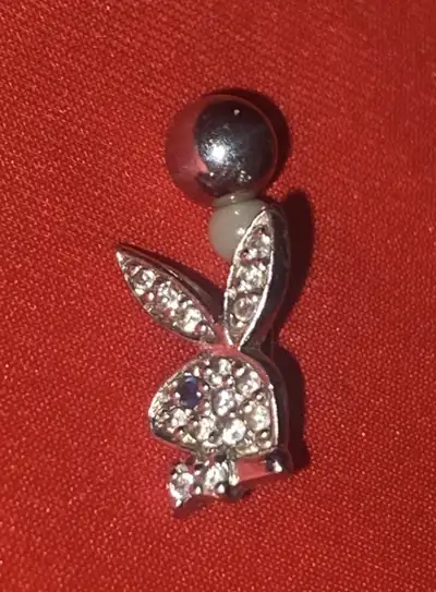 Playboy naval bellybutton body piercing, View more
