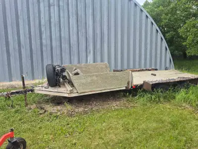 Old boat trailer converted deck 5 ft wide between fenders 17 ft of deck space has old heavy duty win...