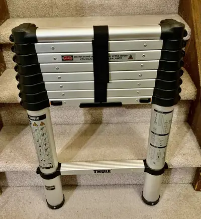 NEW Thule Ladder extends to 8.5 feet and closes to a compact 29.5”. Features a built in air pressure...