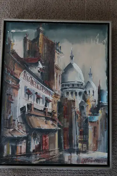 Paris street scenes by Tepo. Each measures 13.5 inches X 17 inches high. One is with church domes in...