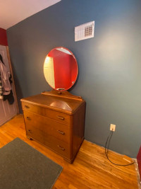 Three drawer wood dresser with mirror
