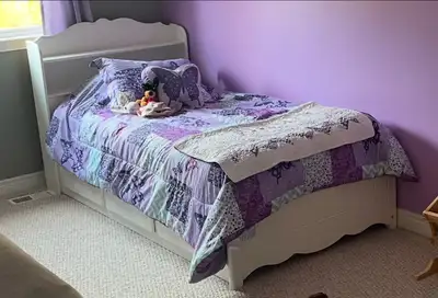Fits twin bed. In used but in great shape. About a food longer total than a twin bed which included...