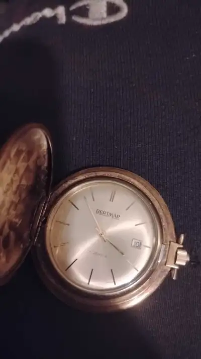 This is a Bertmar 17 Jewels pocket watch that I am selling in used condition. The watch features a g...