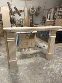 Fireplace mantel with posts. 