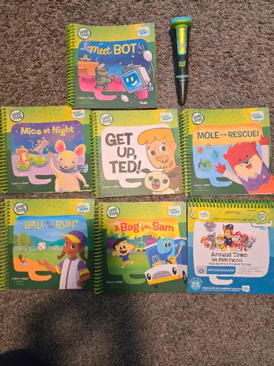 LeapFrog learn to read set with the LeapReader pen. The pen works with all LeapReader book sets. Bas...