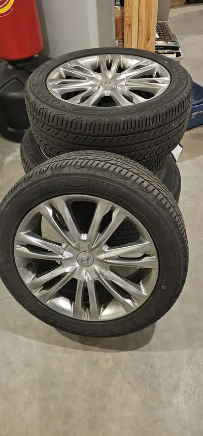 Selling a full set of 4 OEM aluminum rims from a Hyundai Genesis (Sedan) with Yokohama AdvanSport A/...