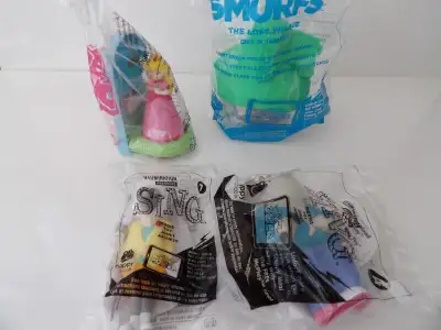 McDonald Happy Meal Toys all sealed in original packages. - 2017 McDonalds Smurfs The Lost Village....