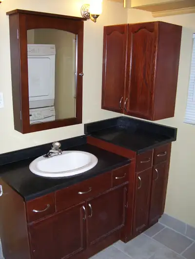 1 BEDROOM, UPPER APT.  WITH LAUNDRY,  AVAIL. AUG. 1