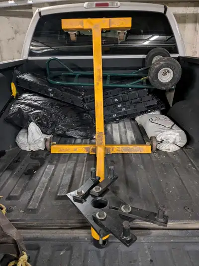 This heavy-duty engine stand is designed to securely hold and rotate engines during repair or assemb...