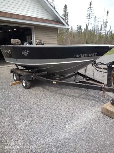 2009 Lund hull( never had a motor on it until I mounted one) boat measures approx 14ft long and over...