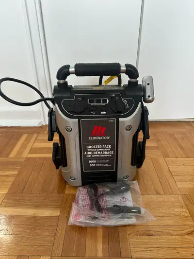 This Eliminator Booster Pack is a reliable and portable solution for jump-starting vehicles and infl...