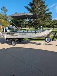 REDUCED.   Smokercraft 15 ' with 20 hp Merc and trailer