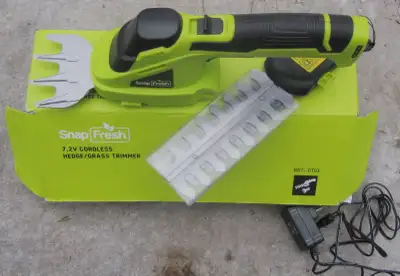 Basically new, it's cordless and comes with the charger and battery built in. Can switch from a gras...