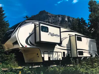 MUST SEE fifth wheel! Original owner, NON-SMOKING and always stored INDOORS when not in use! General...