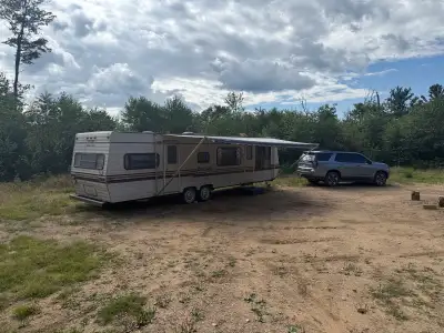 Older 30 foot trailer in good shape. A couple soft spots in the floor awning is good looking to get...